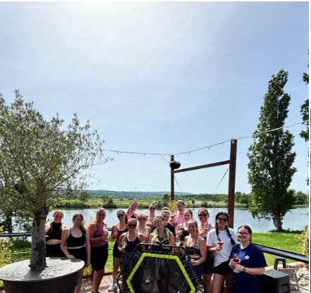 The community together after a lakeside session